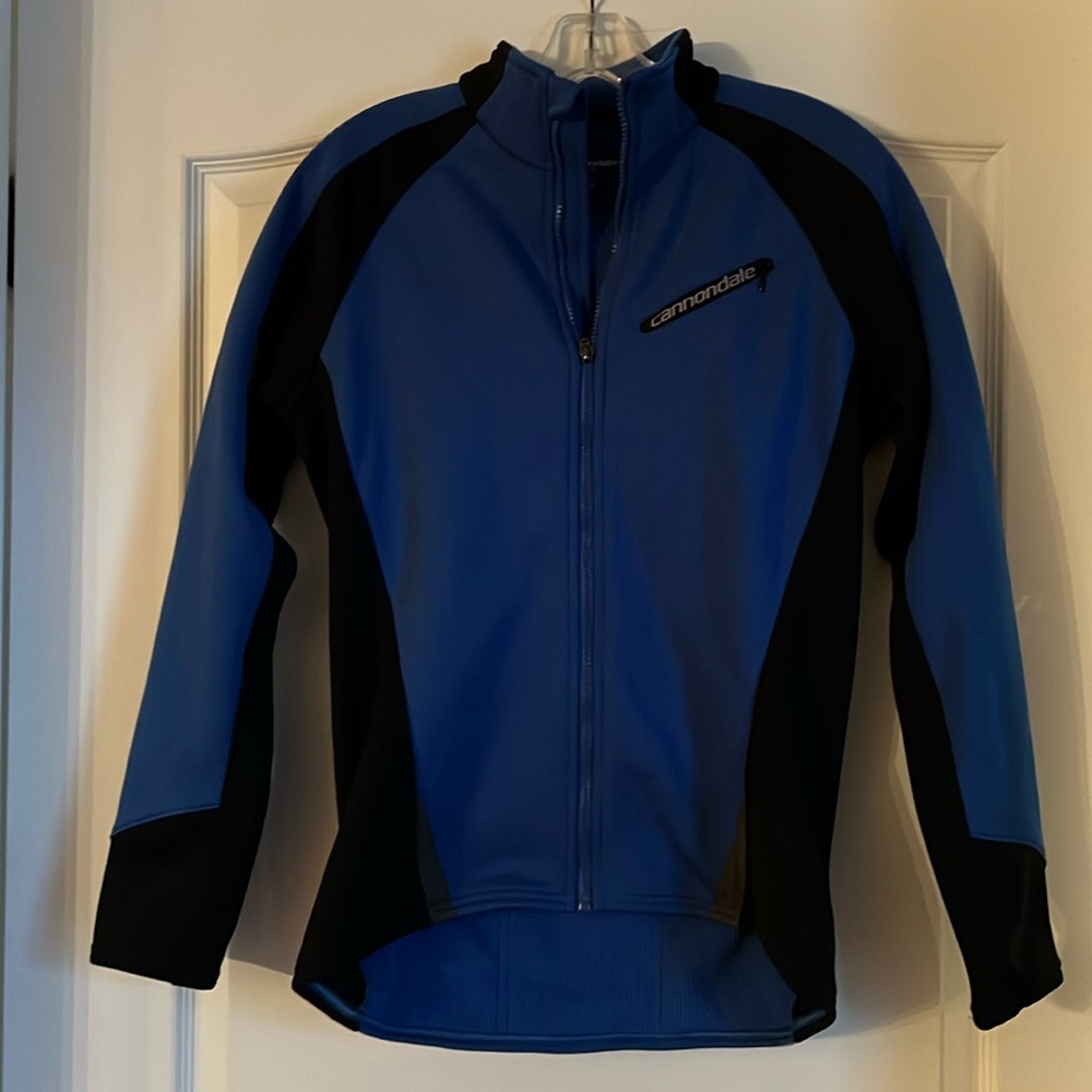 Cannondale Man’s cycling jersey,blue,sized. Never worn.Made in China.Polyester.